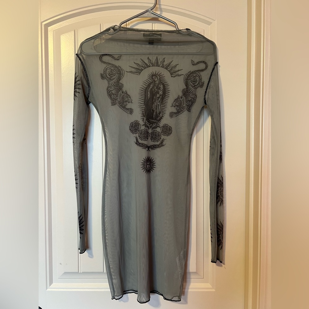 Elegant Sheer Black Dress with Intricate Designs